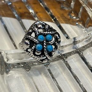 Vintage silver tone Avon ring with turquoise size 5 can be stretched to six